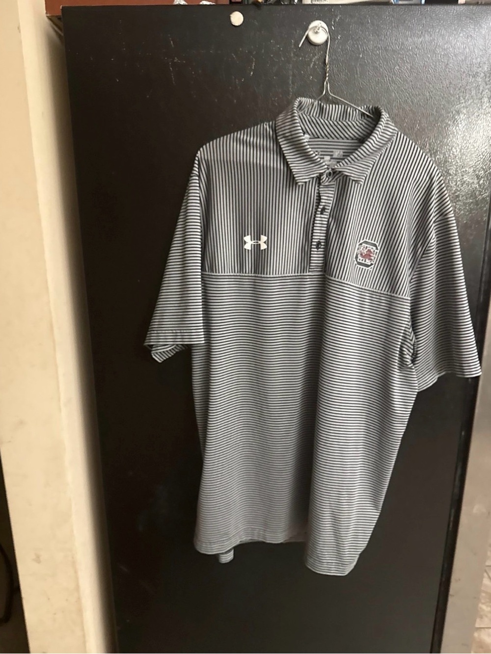 Under Armour Men’s Black and White Striped Polo with Team Crest
